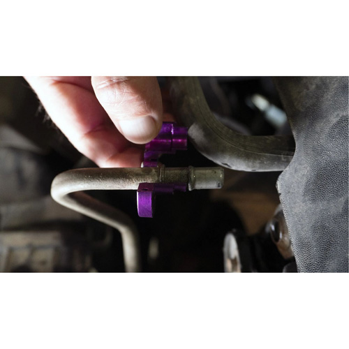 Ensemble de d&eacute;connexion du refroidisseur d'huile de transmission pour Ford R.M.G. Prévention